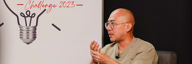 Ang Kian Peng speaking at the Hungry for Change Challenge in 2023